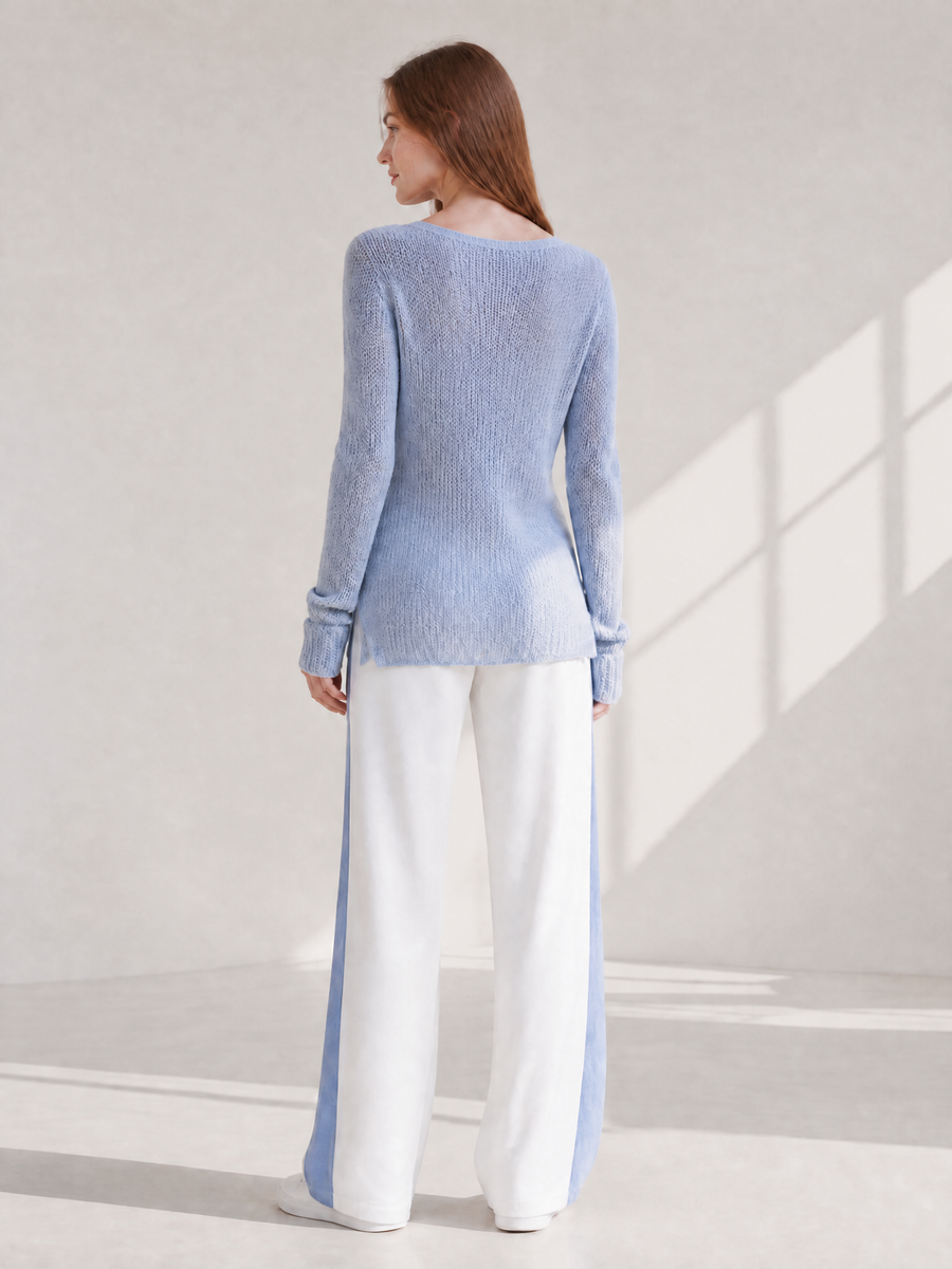 Stylish Casual Set Featuring A Long-sleeved Blue Longline Sweater And White Color-blocked Trousers