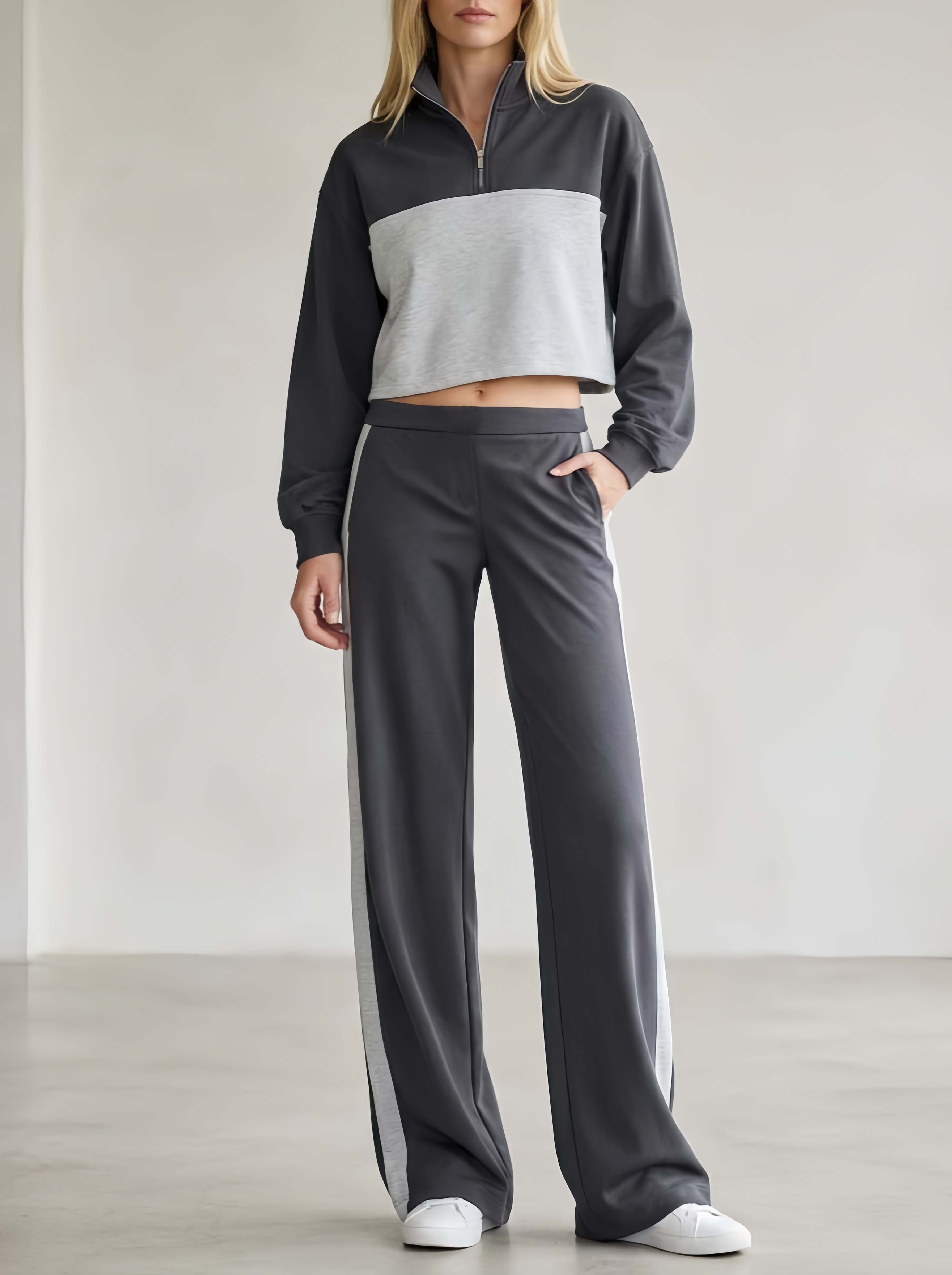 Stylish Athleisure Set Featuring A Long-sleeved Top And Trousers In A Contrasting Light And Dark Grey Color Scheme