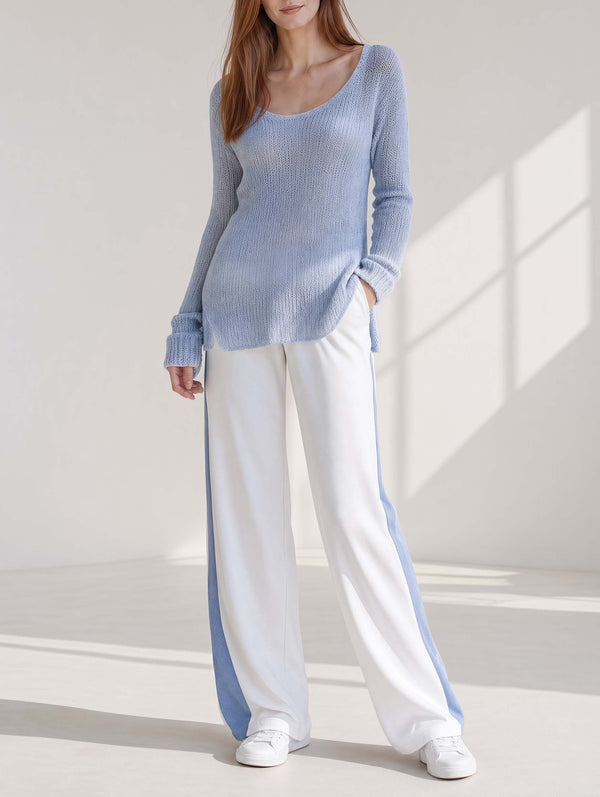 Stylish Casual Set Featuring A Long-sleeved Blue Longline Sweater And White Color-blocked Trousers