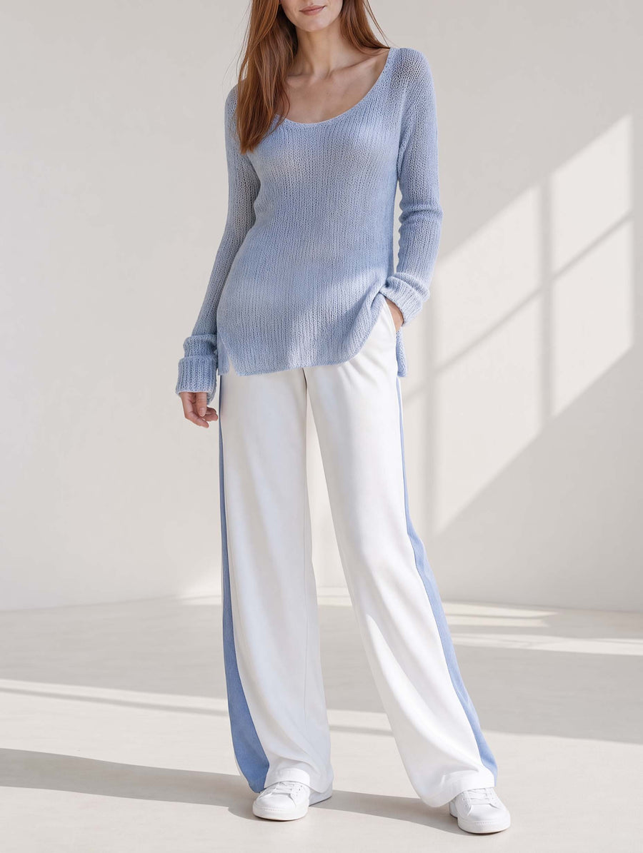 Stylish Casual Set Featuring A Long-sleeved Blue Longline Sweater And White Color-blocked Trousers