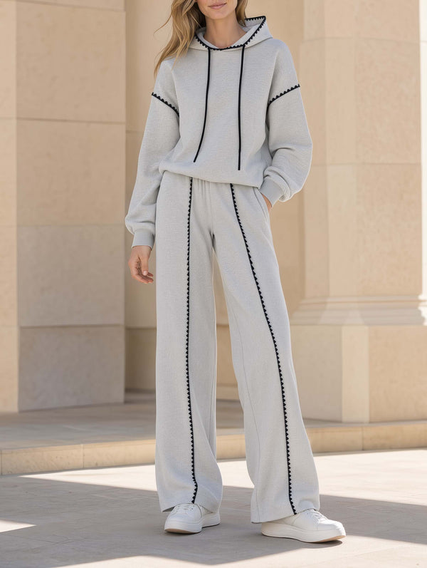 Grey Athleisure Set Featuring A Long-sleeve Hooded Sweatshirt And Wide-leg Trousers