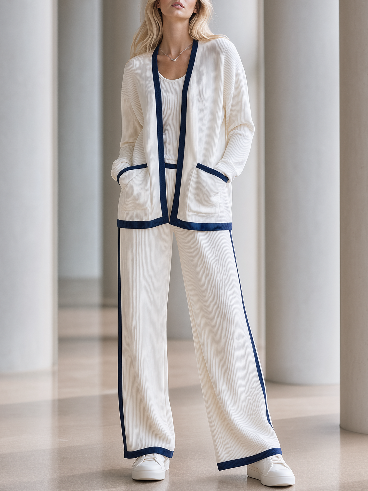 Two-piece Set Featuring A White Color-block Knit Cardigan And Wide-leg Trousers