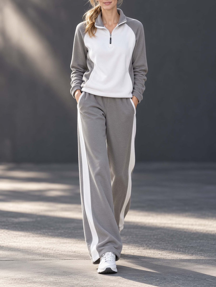 Athleisure Set Featuring A White Color-block Long-sleeve Top With A Half-zip Collar And Grey Trousers