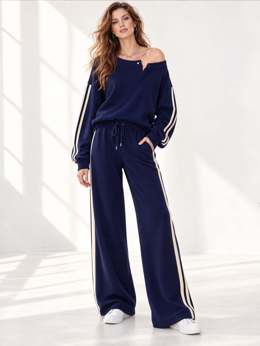 Stylish Navy Blue Long-sleeved Top And Trousers Set Featuring An Asymmetrical Off-the-shoulder Design