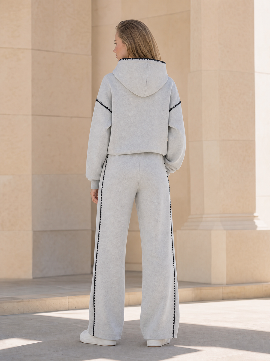 Grey Athleisure Set Featuring A Long-sleeve Hooded Sweatshirt And Wide-leg Trousers